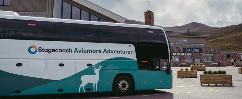 Coach parked up with the text Aviemore Adventurer on the side