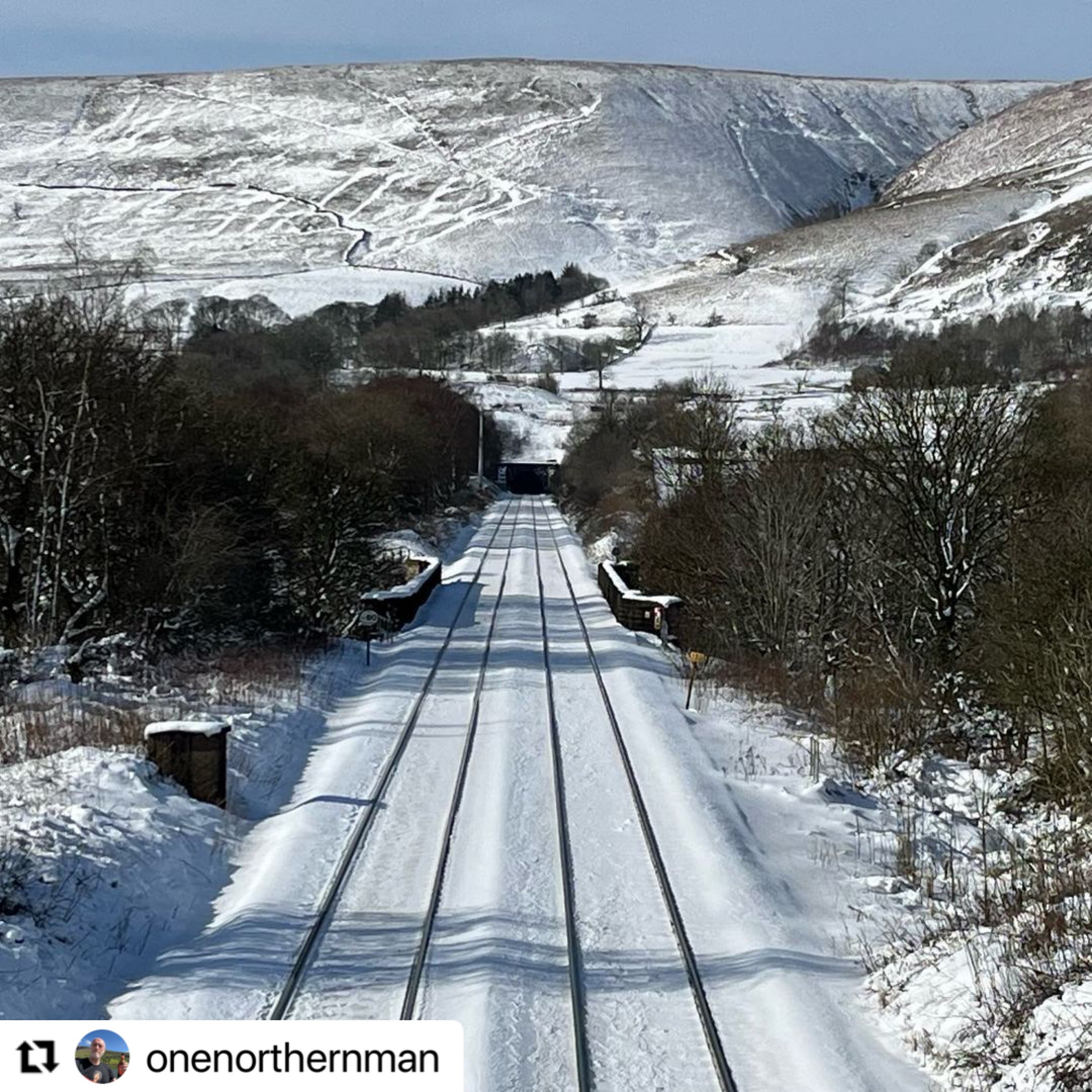 Hope Valley Line route with snowy covers mountains and trees