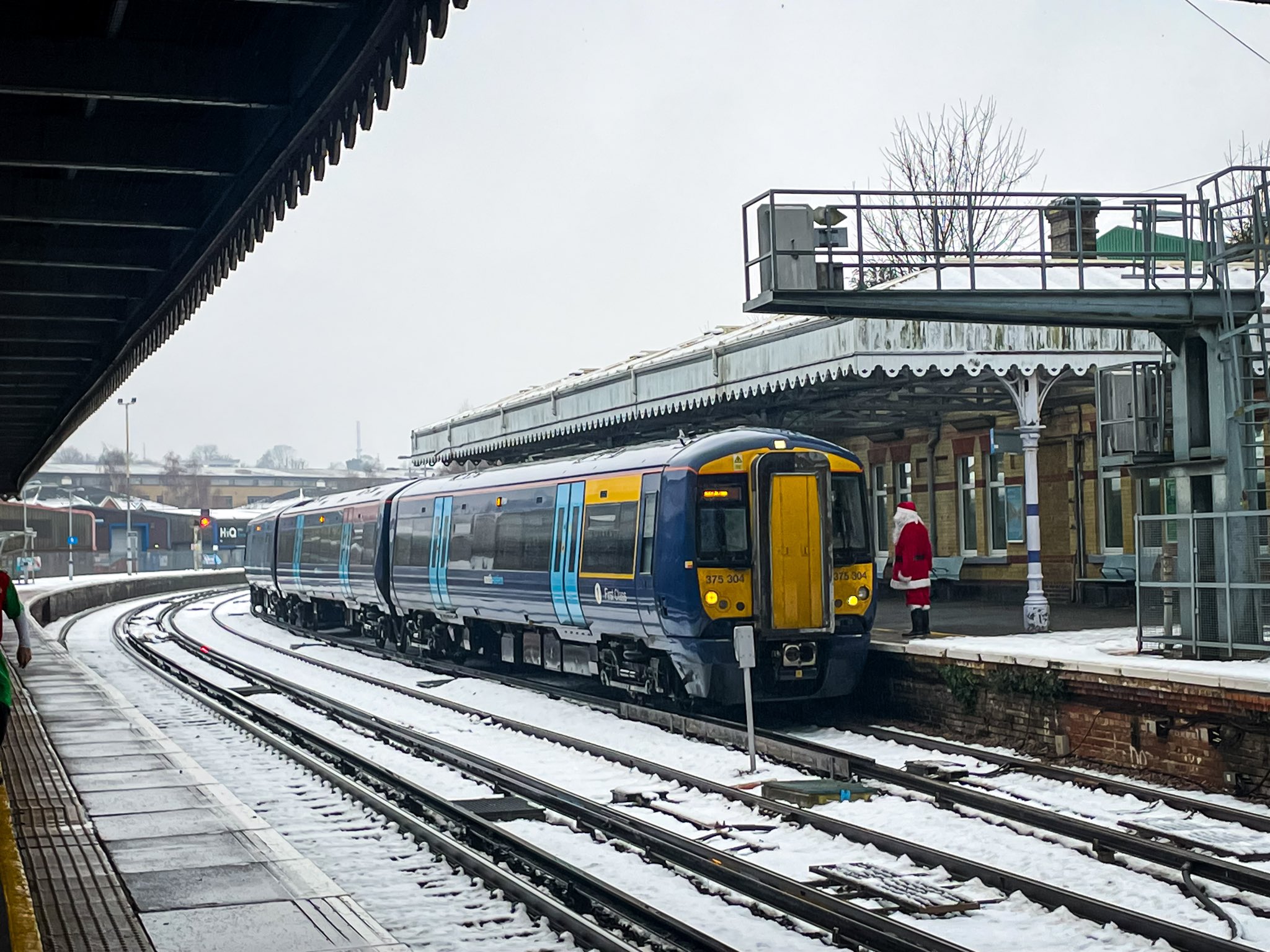 Santa waiting to board the train along the Medway Valley Line