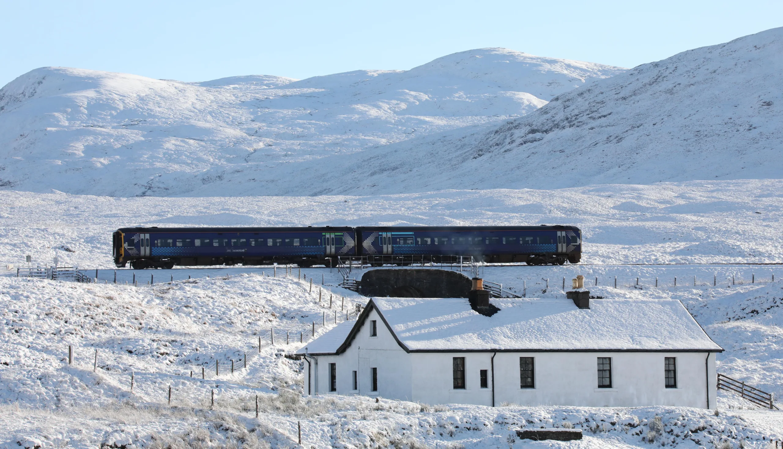 The Inverness to Kyle of Lochalsh train battles through the snow near Achnasheen | Kyle Line | Scenic Rail in Winter