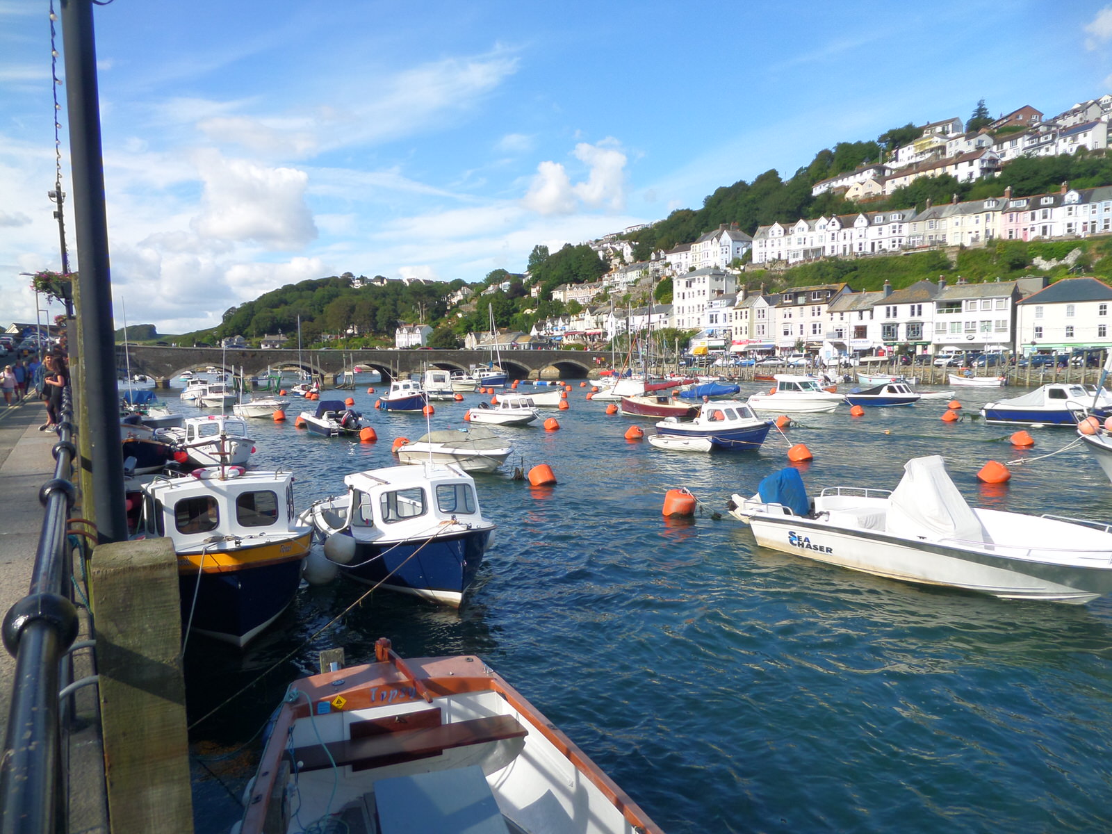 Boating Dock in Looe, Cornwall, with Looe village in the background.