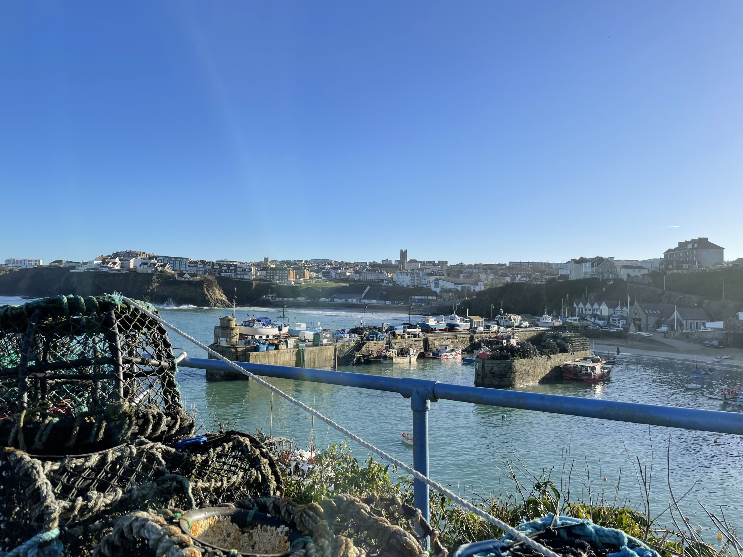 Newquay harbour with blue sky