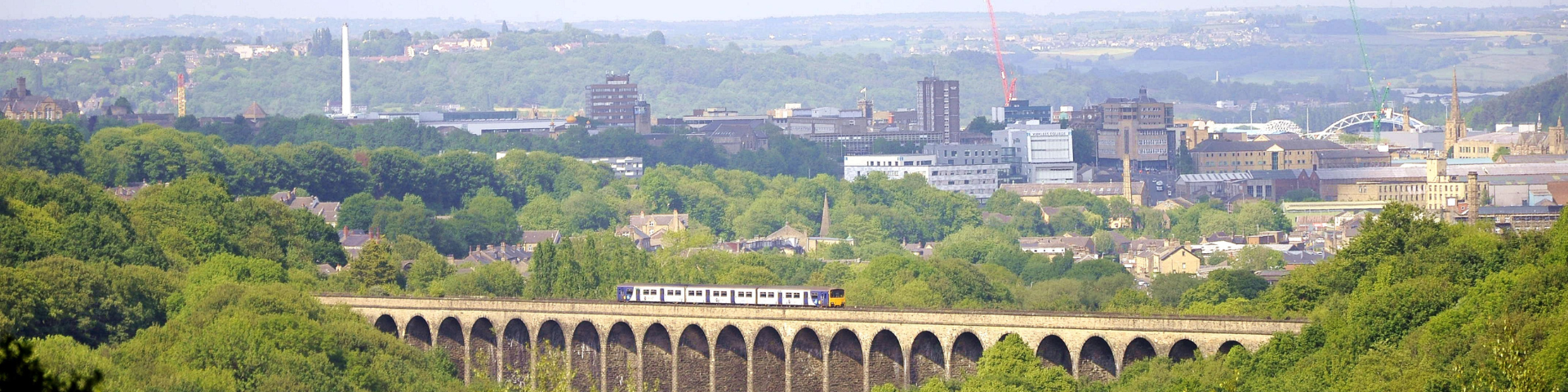 Lockwood Viaduct with view of Huddersfield in the background