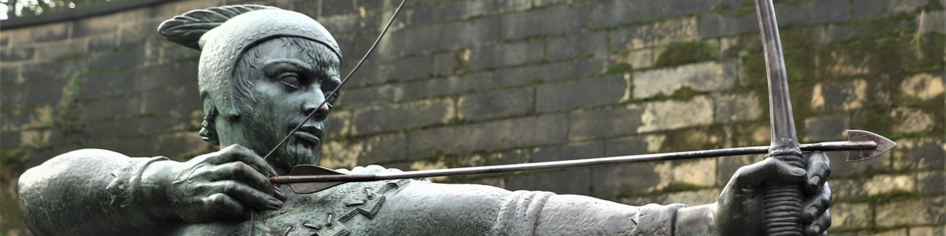 Statue of Robin Hood and his famous bow and arrow, located in Nottingham, Midlands