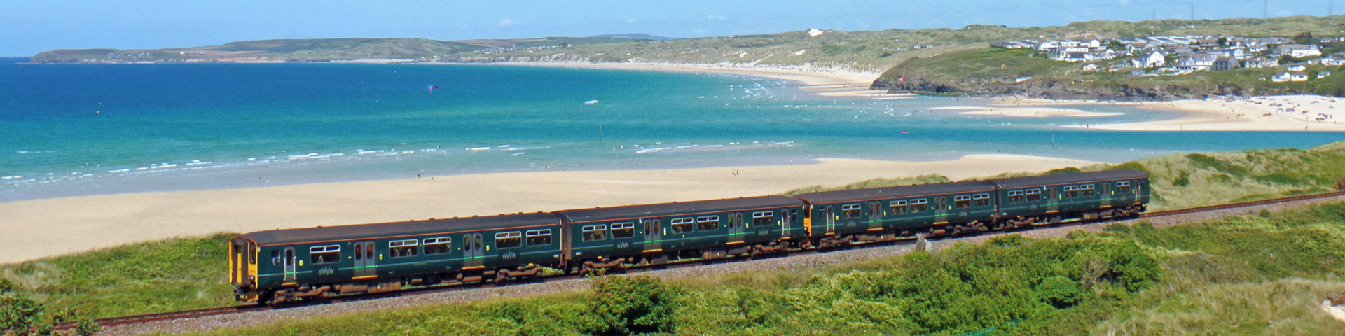 Coastal train trip with thhe beautiful blue sea in the background