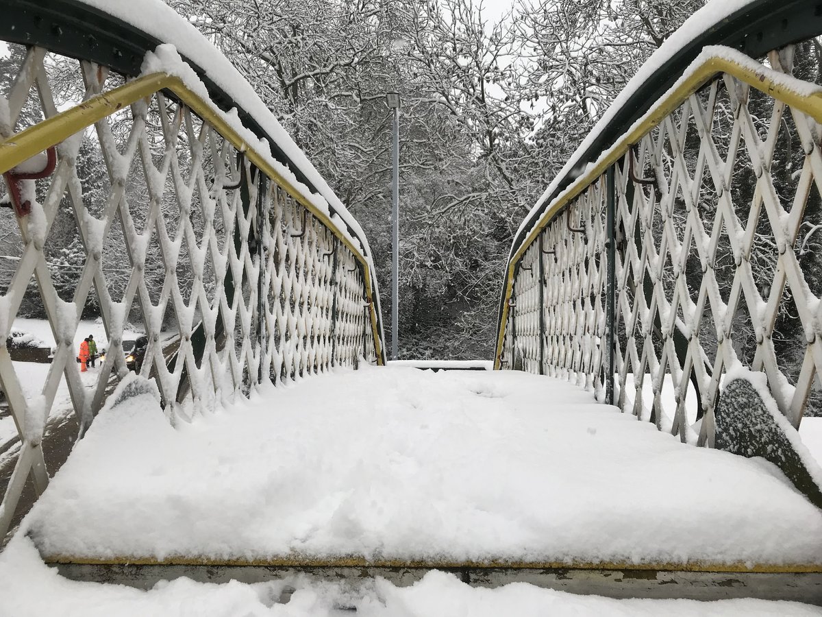 Brundall station footbridge covered in snow