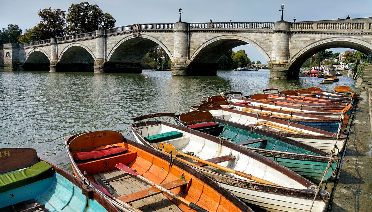 Richmond stone bridge over the River Thames and boats