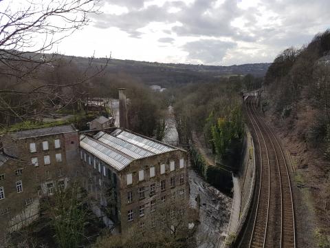 A view overlooking mills and the railway near New Mills