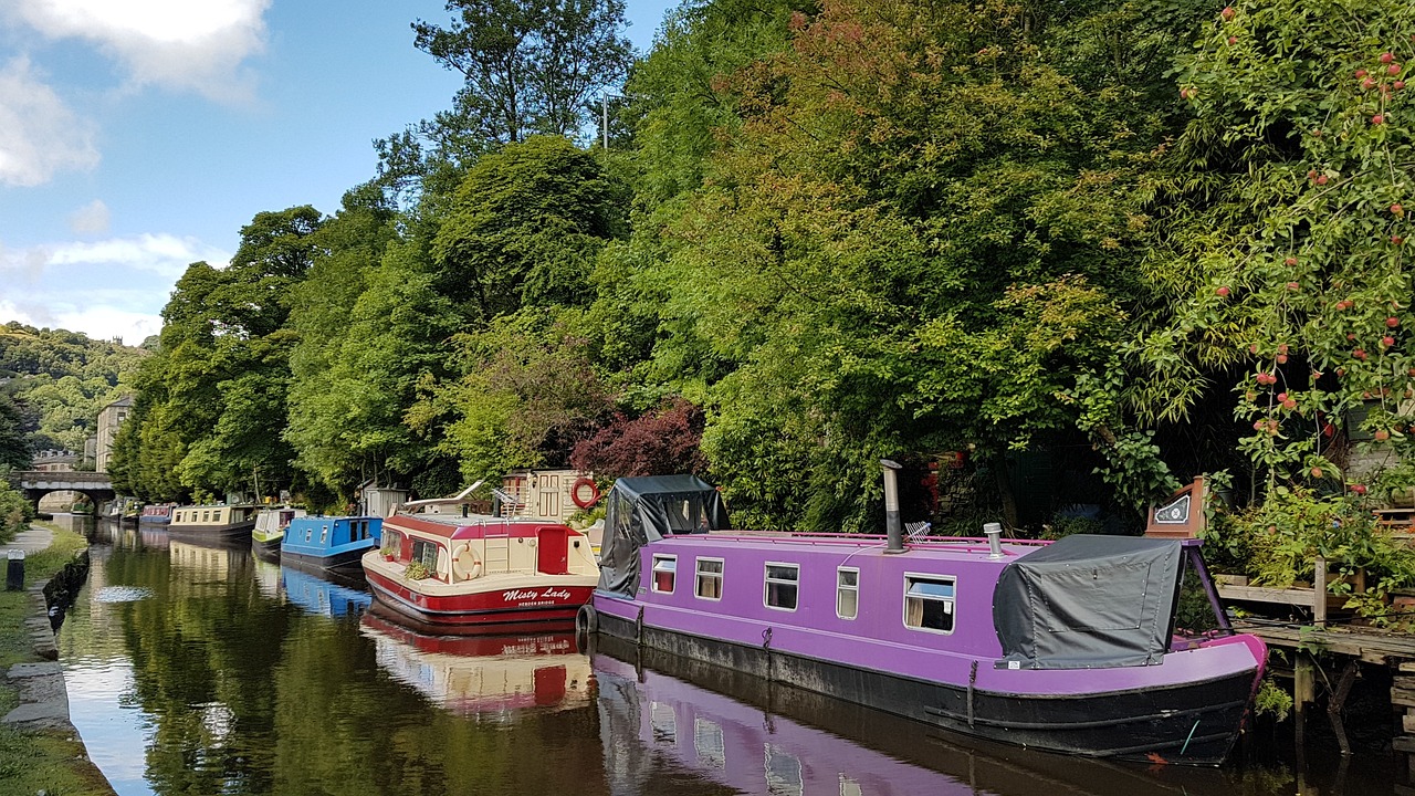 Canal boats moored up in Hebden Bridge along the Calder Valley Line