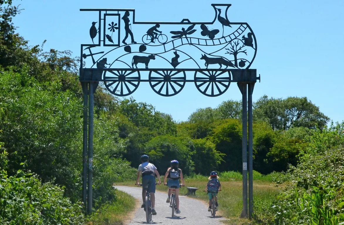 Iron train arch marking the entrance to Strawberry Line - explore Somerset by bike