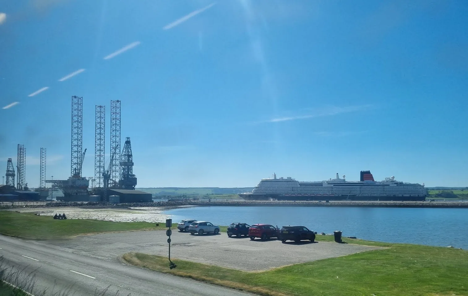 VIew of cruise ship in the port with blue sky along the Far North Line | scenic rail views