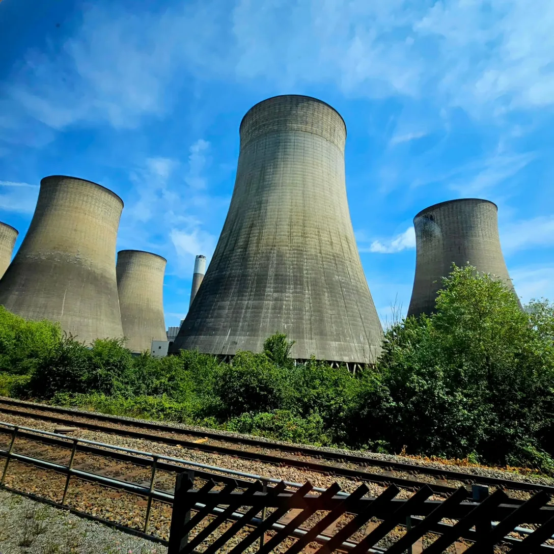 View of power station cooling towers from the train | scenic rail views
