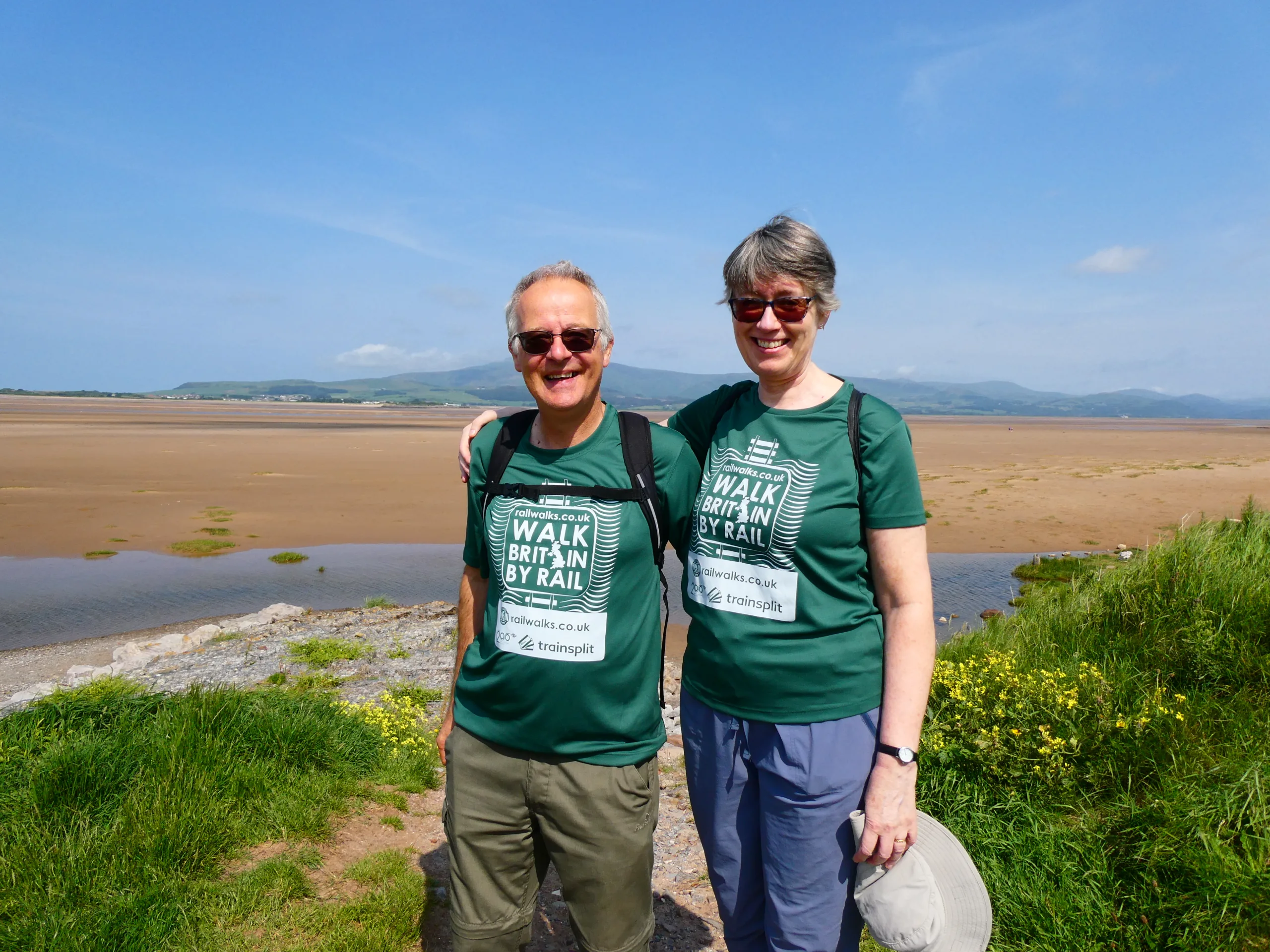 Couple stood by the coast