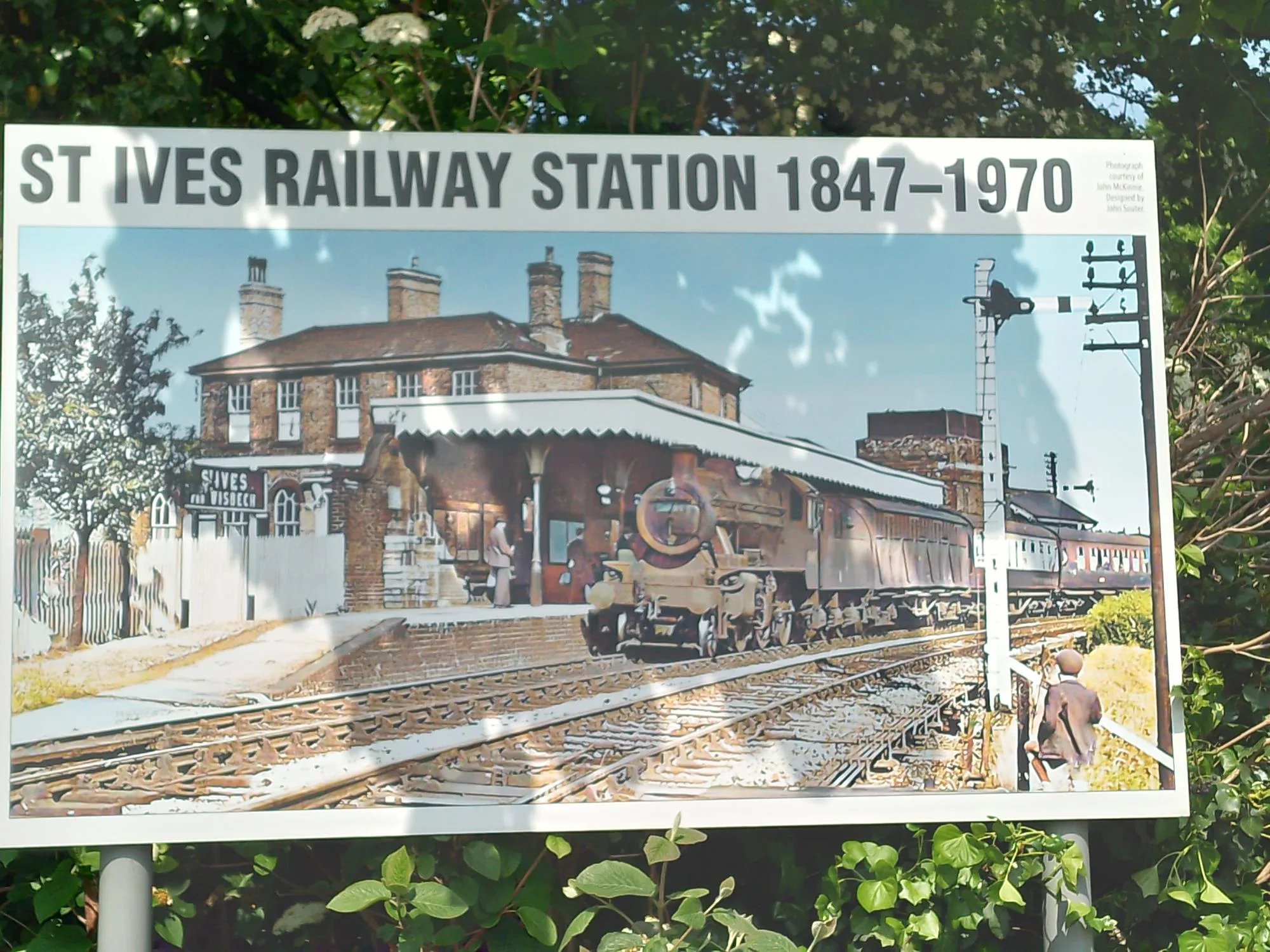 A photo of a heritage display board showing what the railway station used to look like between 1847 - 1970.